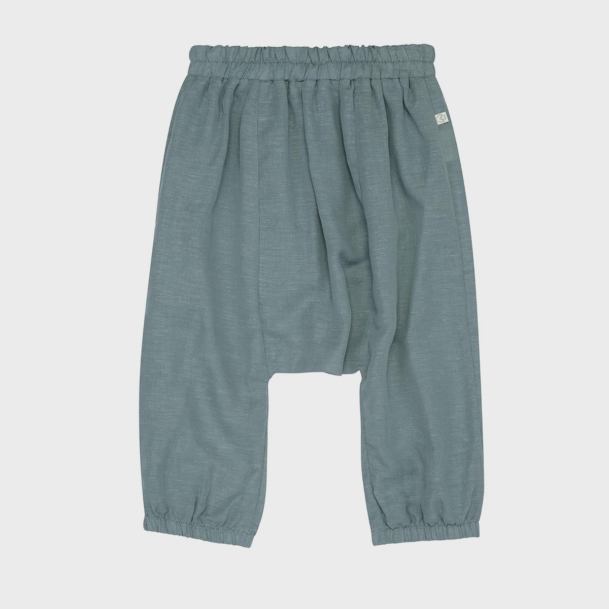 Pantaloni harem per neonati in canapa biologica blu ERA – morbidi, con protezione UV & Antibatterico