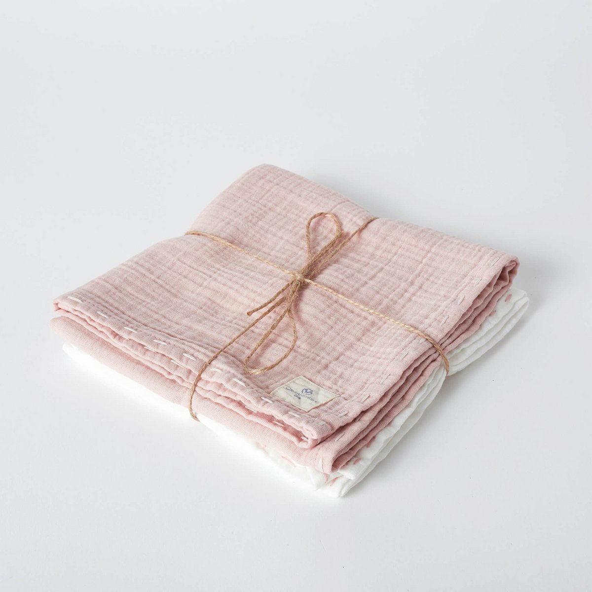 Handgestickeltes Bio-Musselin-Set in einem coolen Rosa