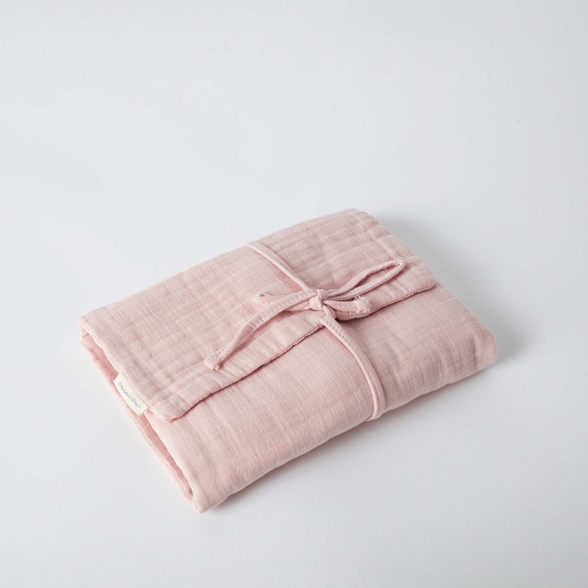 Bio-Musselin Wickelunterlage Rose, faltbar, weich und saugfähig für unterwegs.